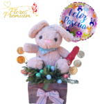 ARREGLO PASCUERO PELUCHE 20CM, HUEVITOS, MONEDITAS, CONEJITO DE CHOCOLATE Y GLOBO