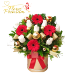 BOX DE 3 GERBERAS, 6 ROSAS, FOLLAJE Y DECORACION NAVIDEÑA