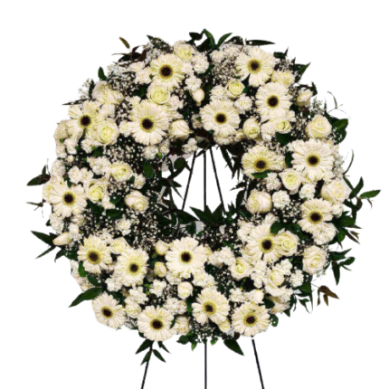 CORONA  DE GERBERAS ROSAS Y FOLLAJE CON ATRIL