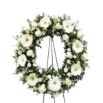 CORONA  DE GERBERAS Y ROSAS CON ATRIL